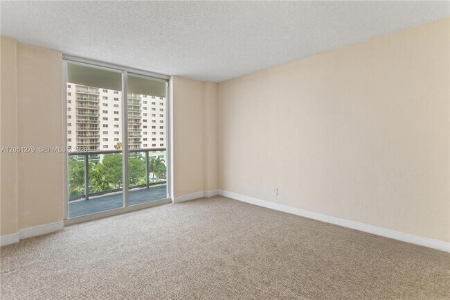 Building Photo - 19390 Collins Ave