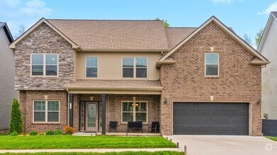 Building Photo - Modern 6-Bedroom Home with Open Layout & S...