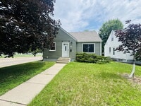 Building Photo - Charming 4-Bed Home with Gleaming Hardwood Floors, fully fenced backyard - 1500 Sq Ft in Minneapo...