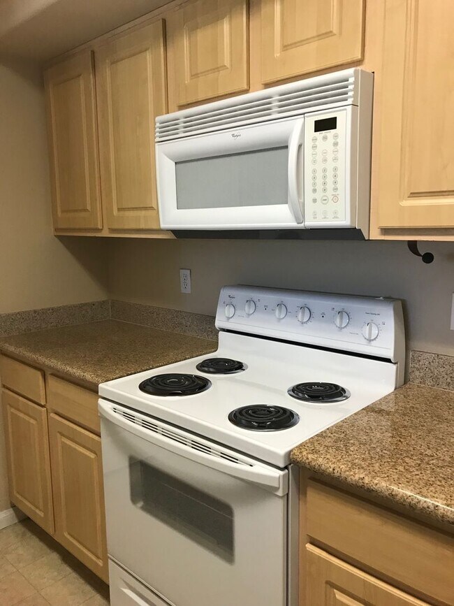 Building Photo - Cozy 1 Bedroom Condo 2nd Floor At Coronado...
