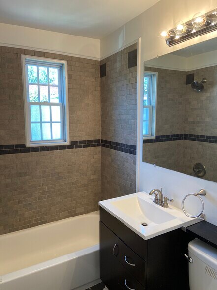 Bathroom with window for more natural light - 2576 Sherman Ave NW