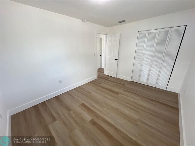Building Photo - 10540 NW 28th Ave