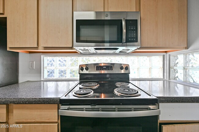 Building Photo - 3065 N 67th Ave