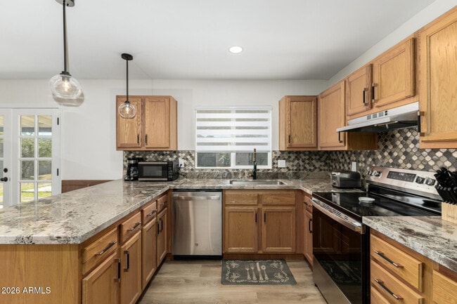 Building Photo - 4743 W Villa Theresa Dr