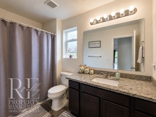 Building Photo - Spacious 3-Story Home with Flexible Living Space, Heat Pump & Private Deck Retreat