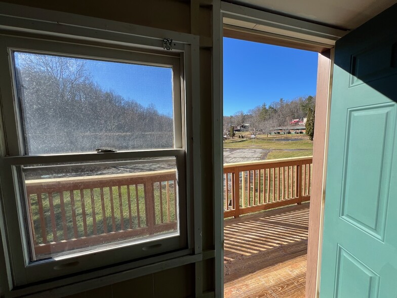 Porch off both main floor bedrooms - 131 Old US Highway 321