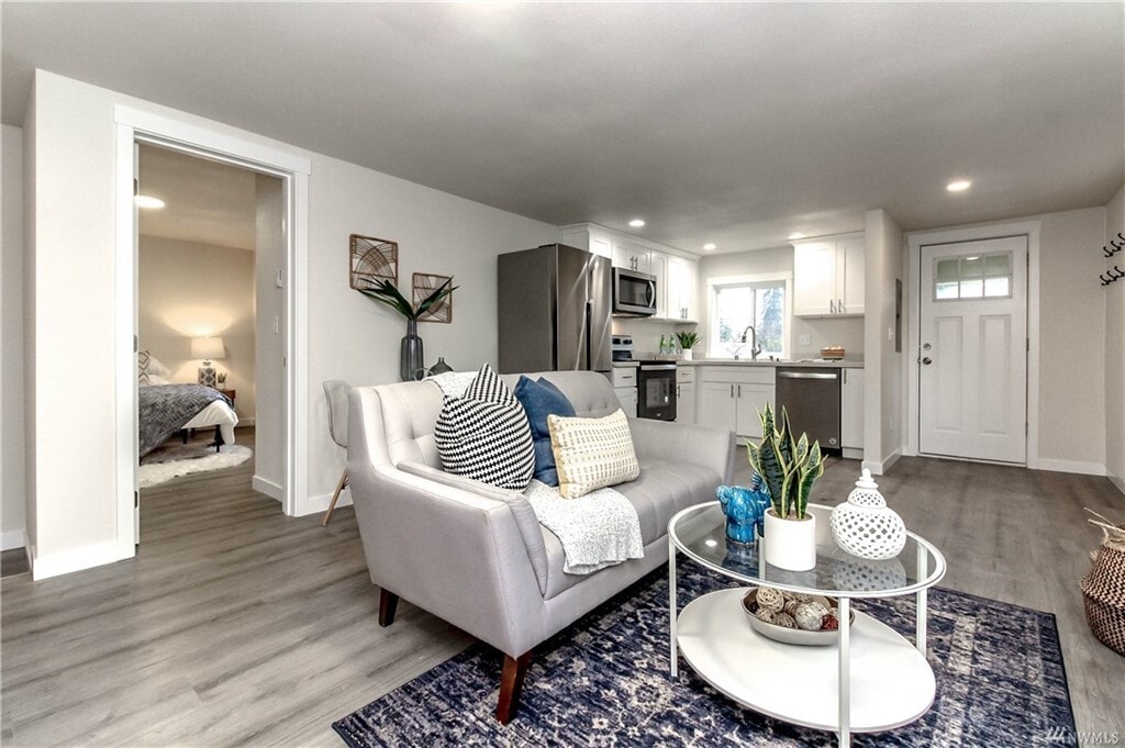 Main living area with all new stainless appliances! - 1519 S 46th St