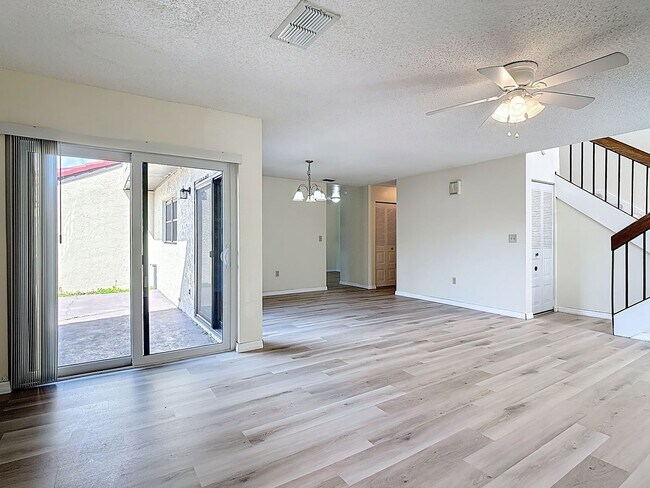 Building Photo - Spanish-Style 3 Bedroom, 2.5 Bath Mediterranean Rooftop Townhouse – Basic Cable & Wi-Fi Included!