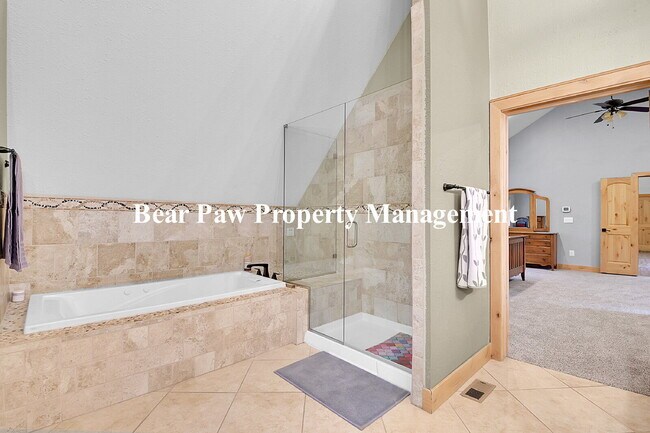 Building Photo - Spacious 4-Bedroom Retreat in Scenic Conif...