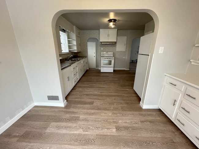 View from dining area through kitchen - 1831 Smith St