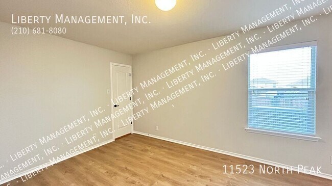 Building Photo - 11523 North Peak-