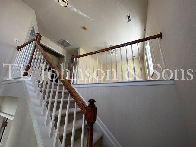 Building Photo - Spacious 3 Bedroom Home with Primary Suite on Main, Gas Fireplace & Patio in Advance!