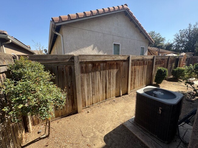 Building Photo - Two story home in gated community Availabl...
