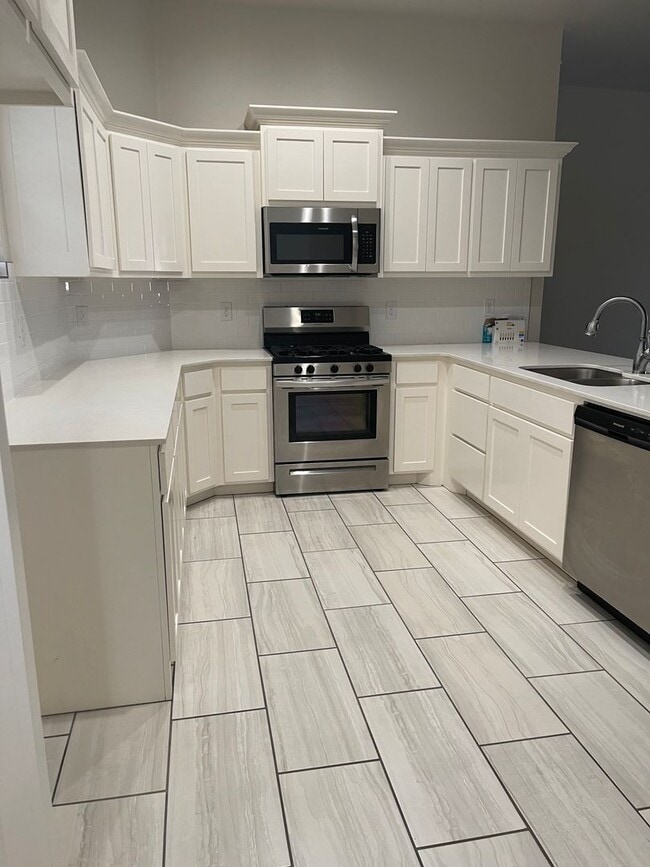 Building Photo - Two bedroom two bath home with a study.