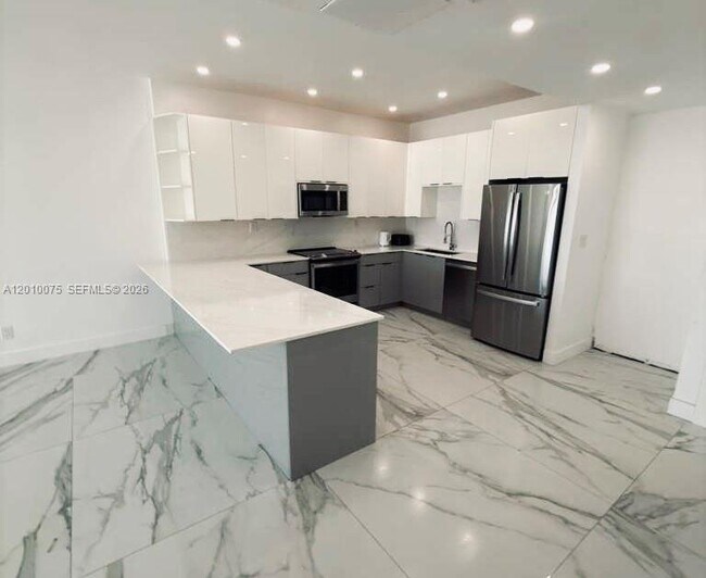 Building Photo - 19370 Collins Ave