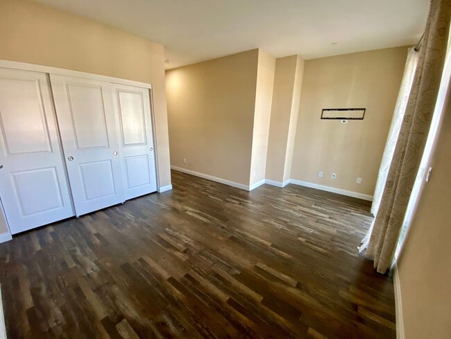 Building Photo - Stylish 3-Story Townhome with Balconies & Open-Concept Living