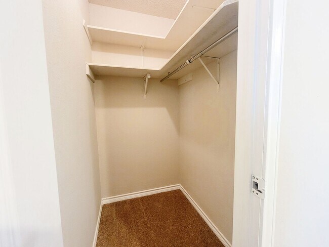 Building Photo - Warm & Inviting 4BR / 2.5BA Home with Covered Deck and 2-Car Garage