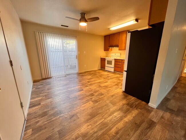 Kitchen with slider to backyard & ceiling fan - 5026 Dana Ave