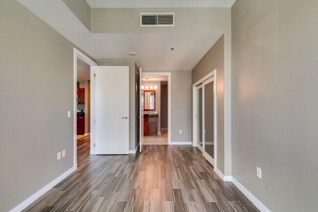 Building Photo - Iconic Strip-View Luxury | Elegant 1BR + Den High-Rise Residence