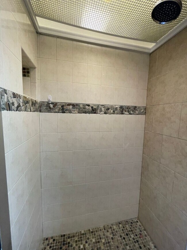 Building Photo - Small pets are welcome with an additional ...