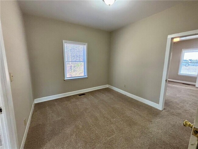 Building Photo - 3302 N Bogan Rd NE