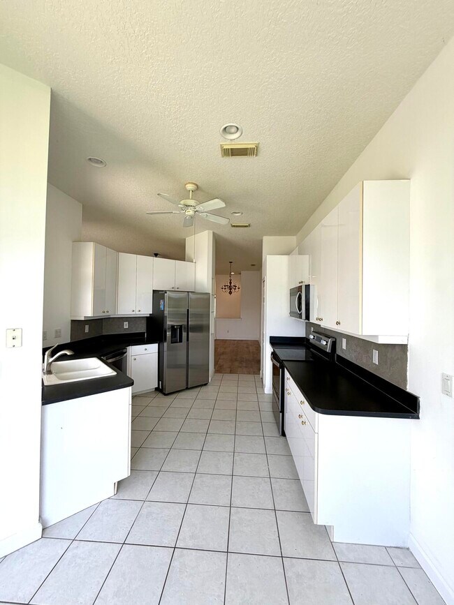 Building Photo - 702 SW Aruba Bay