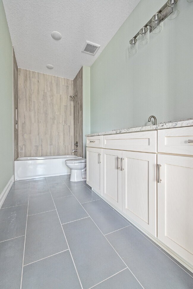 Building Photo - MODERN 4-BEDROOM TAMPA HOME | BUILT 2023 | FENCED YARD | PET FRIENDLY