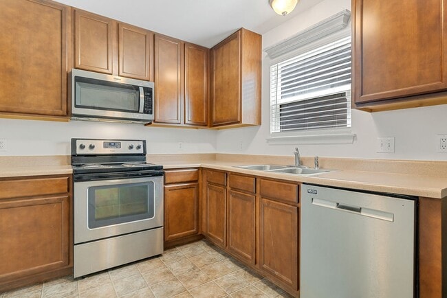 Building Photo - COMING SOON Spacious 4-Bedroom Condo for Rent – Prime Location!