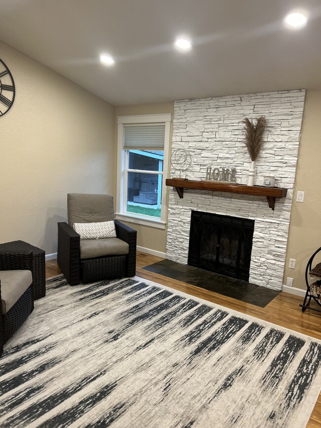 Family room, wood burning fireplace - 5227 140th Pl NE