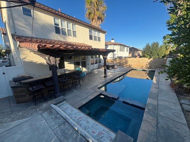 Building Photo - Stunning 5-Bedroom Pool Home with Private ...