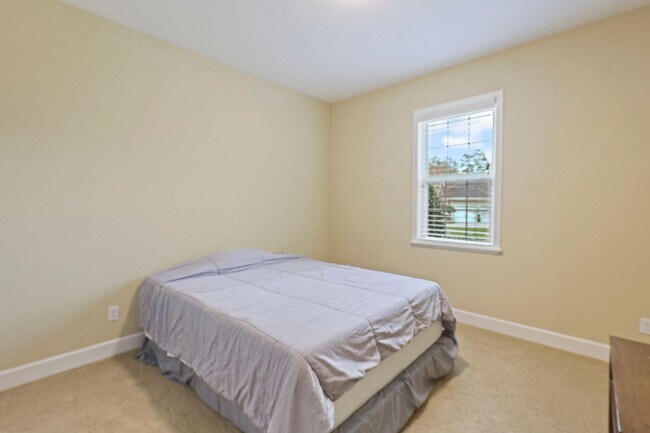 Building Photo - A Sunlit Custom Yellow Cottage in Greystone - Where Comfort Lives!