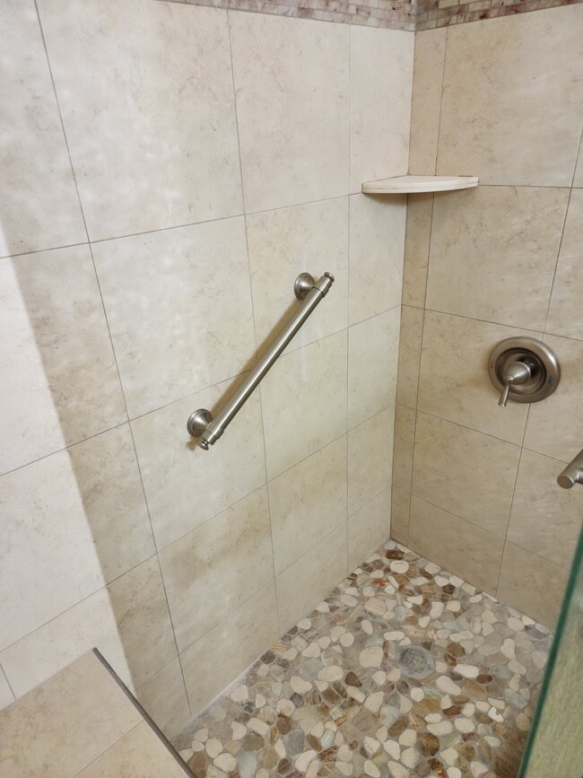 Bathrooms updated to walk-in shower w/bench - 9451 E Becker Ln