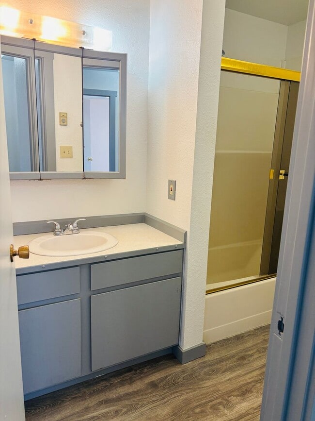 Building Photo - Renovated 3BR condo w/ garage & private yard **MOVE IN SPECIAL - $100 off each month**