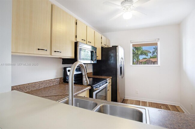 Building Photo - 9431 Boca Cove Cir