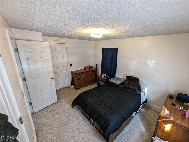 Building Photo - 6719 N Ridge Rd E