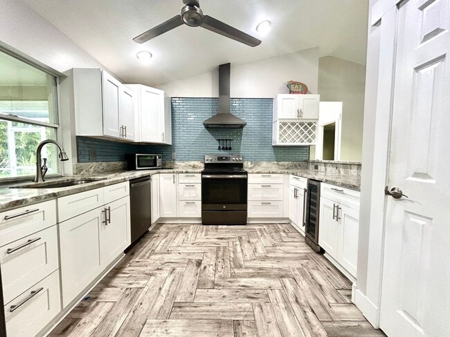 Building Photo - You will LOVE the beauty of this newly remodeled 3/2/2 pool home!