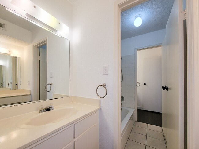 Building Photo - Beautiful two-story corner unit filled with natural light!