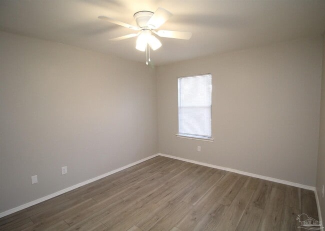 Building Photo - 6810 Tiki Ln