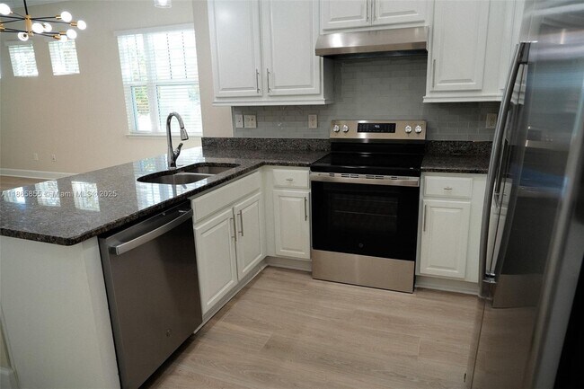 Building Photo - 8282 Tavistock Lakes Blvd