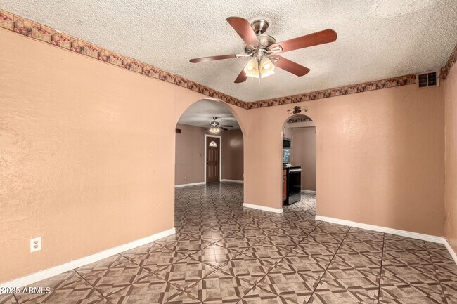 Building Photo - 3316 N 63rd Ave