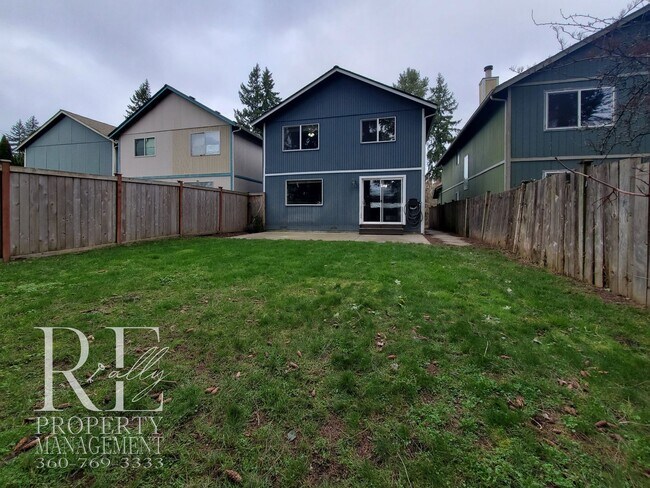 Building Photo - Modernized Two-Story with Open Layout, Gas Fireplace & Large Fenced Yard
