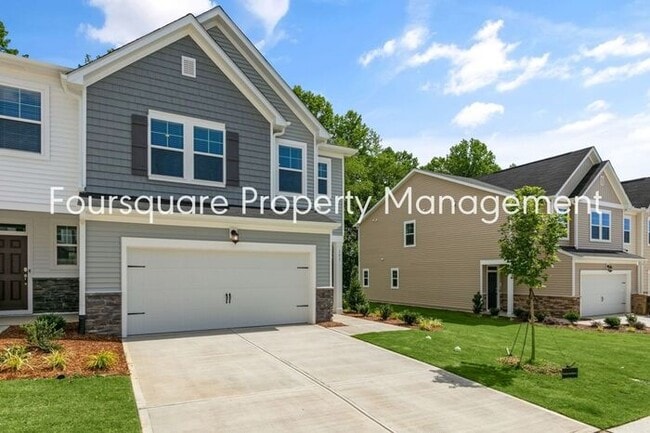 Building Photo - Coming Soon; July 27, 2026 : End unit ToSpacious End-Unit Townhome with 2nd Floor Loft, Screened-...