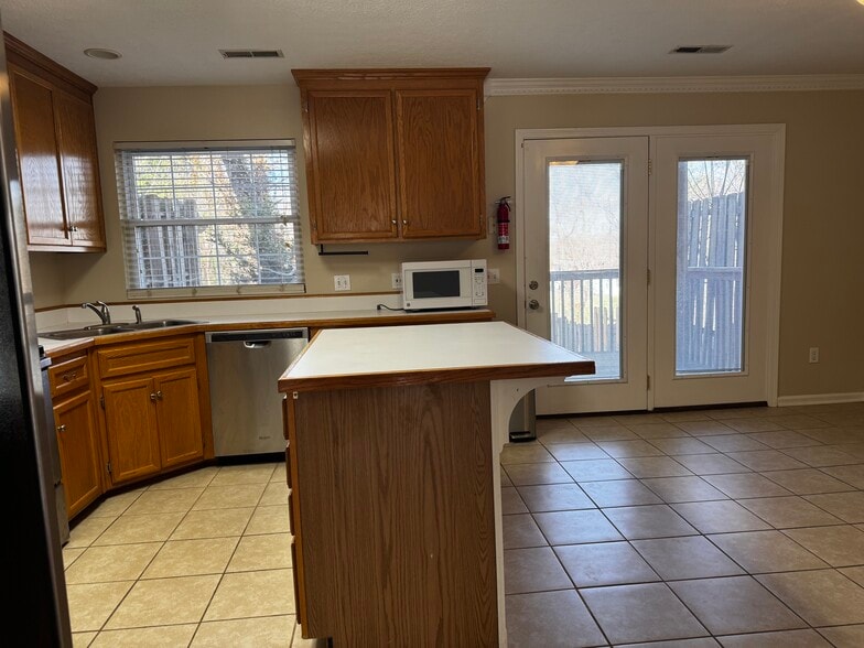 Kitchen and dining room doors to back deck - 855 S Grant St