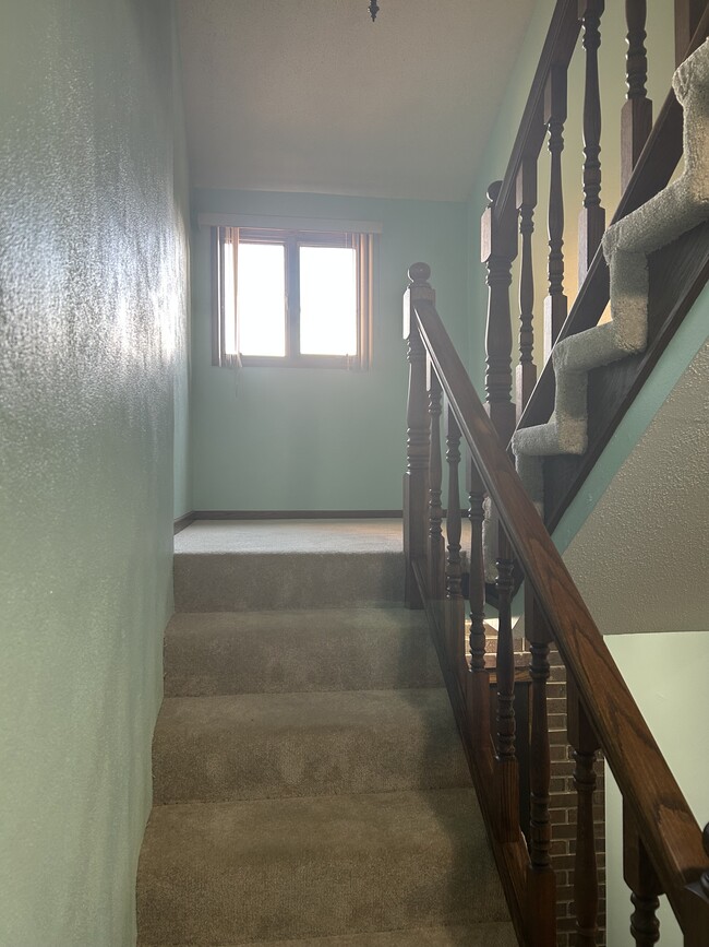 Stairwell to sitting area - 2716 E Bragstad Dr