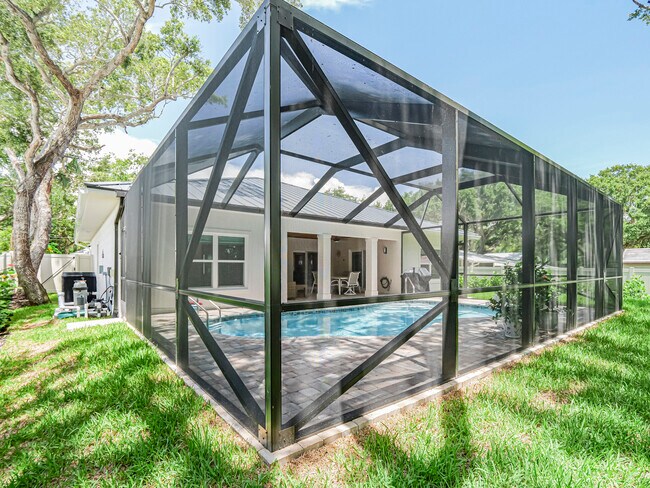 Building Photo - 9340 Frangipani Dr