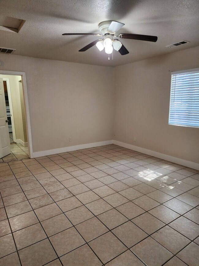 Building Photo - 3 bedroom 1 bath with Garage converted to ...