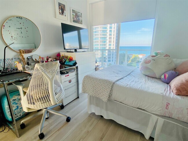 Building Photo - 5900 Collins Ave