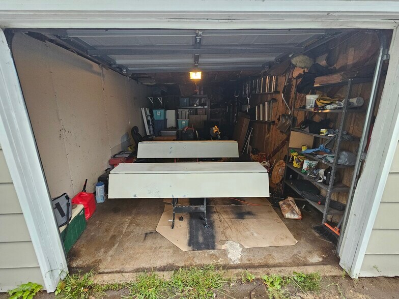 (messy garage) - 7891 Firwood Way NE
