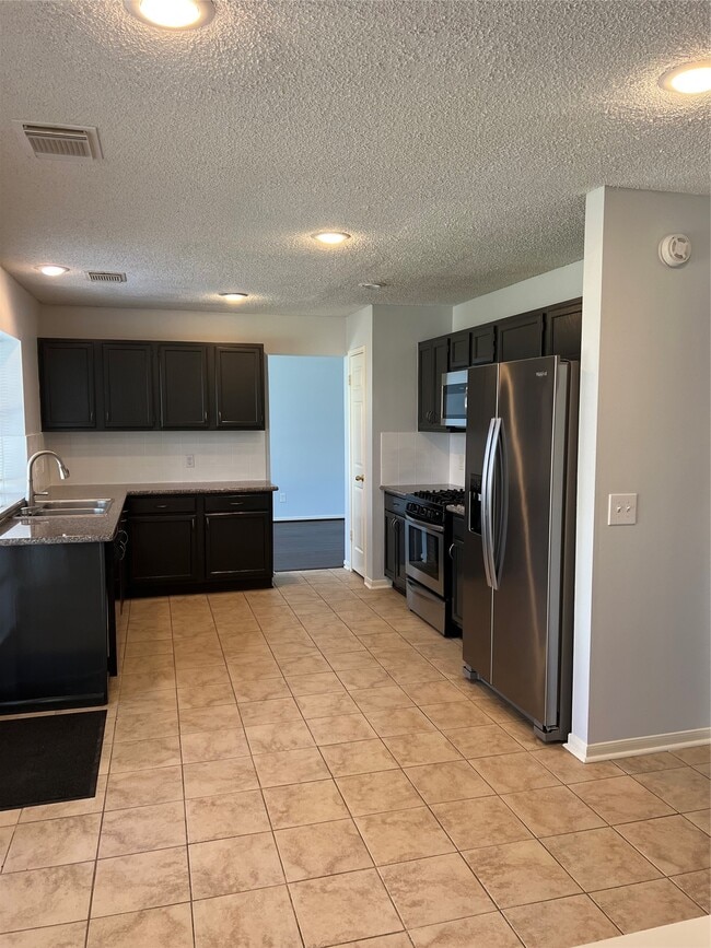 Building Photo - 10018 Storm Meadow Dr