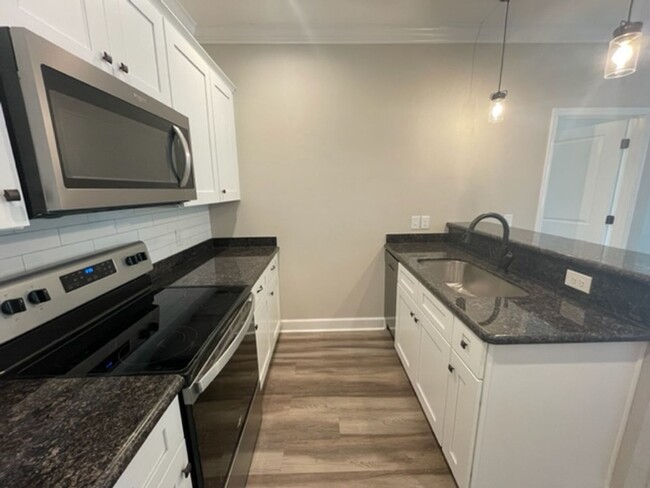 Building Photo - New Construction - Beautiful 2 Bedroom, 2 ...